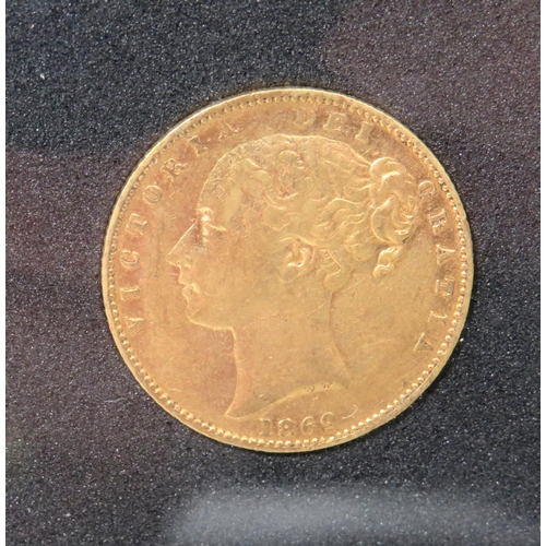 218 - 1869 Gold Sovereign. Queen Victoria, Young Head, Sheild Reverse in Fair to Fine condition.. Set in p... 