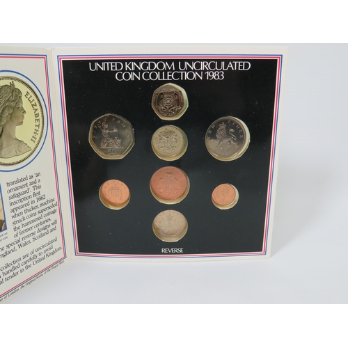 235 - United Kingdom 1983 Uncirculated Coin Collection with card and one pound note. Eight Coin Set  RM13.... 