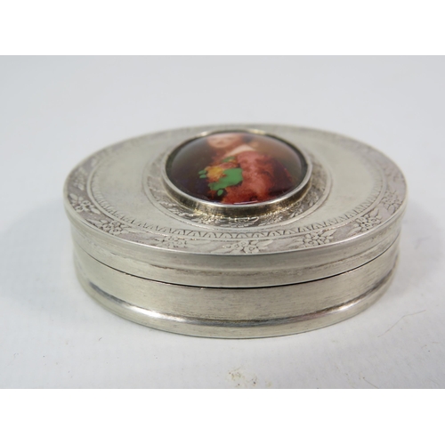 146 - Sterling silver pill box with ceramic cabochon, London 1999, 4cm by 4.5cm. 25.4 grams