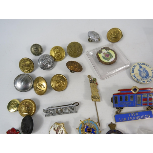 156 - Selection of various badges and buttons relating to the military, transport, bowling etc.