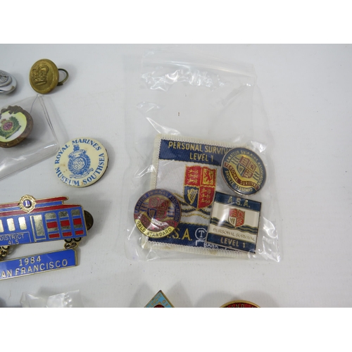 156 - Selection of various badges and buttons relating to the military, transport, bowling etc.