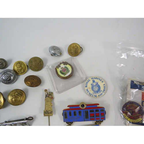 156 - Selection of various badges and buttons relating to the military, transport, bowling etc.