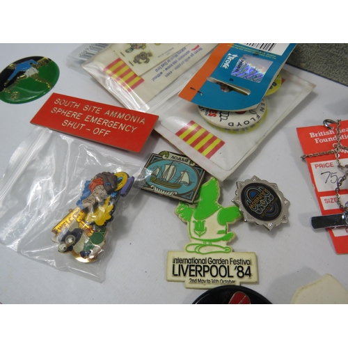 159 - Large selection of vintage badges, tokens, coins and other collectable items.