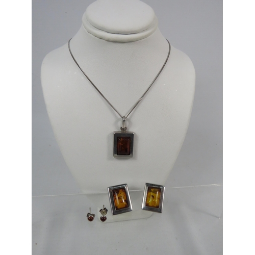 163 - 925 silver Amber Pendant and Earring set with chain plus a pair of amber stud earrings.