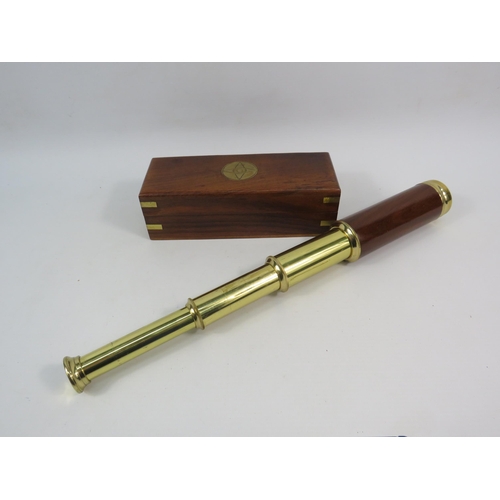 165 - Brass and wooden extending telescope with wooden box.