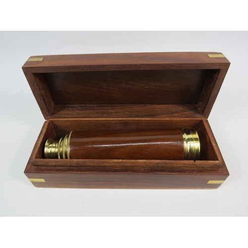 165 - Brass and wooden extending telescope with wooden box.