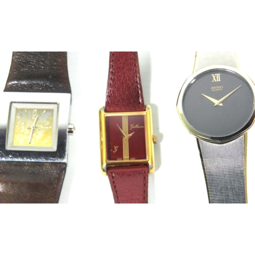 265 - Three Gents Quartz watches by DKNY, Seiko and Guillame.  All in running order. See photos