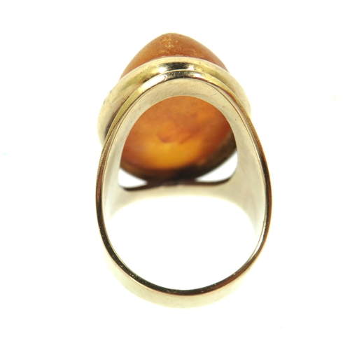 269 - Stunning 9ct Yellow Gold Ring set with a large oval Amber Cabouchon. Ring size 'M'  Inclusions to Am... 