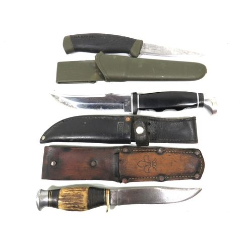 284 - Three Hunting knives with scabbards.  See photos for details.