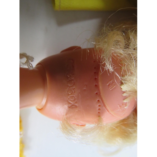 1048 - Three vintage Sindy dolls and a selection of clothes etc, Marks to the back of the heads & one has a... 