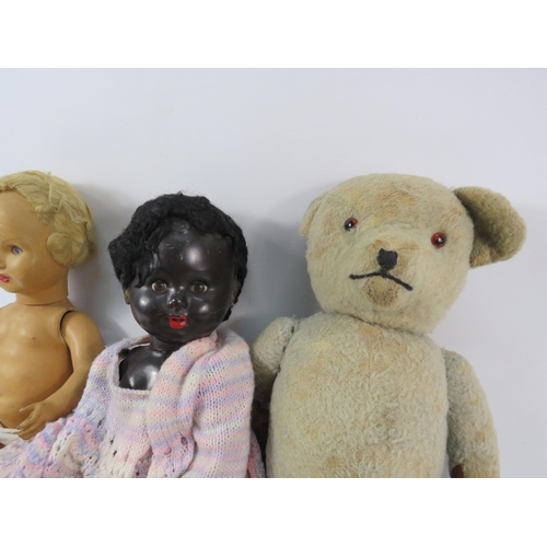 1059 - Three vintage dolls and a vintage teddy bear.