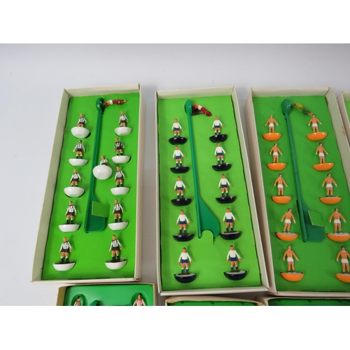 1063 - Ten boxed vintage Subbuteo teams. (one is missing a goal keeper)