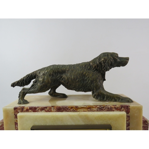 183 - Large French art deco marble mantle clock with bronze alloy gun dog figure to the top, in running or... 