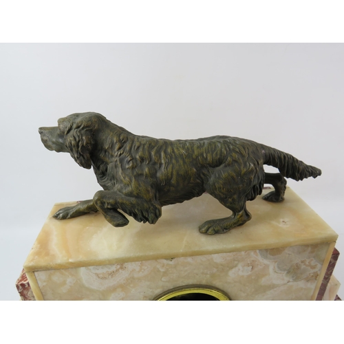 183 - Large French art deco marble mantle clock with bronze alloy gun dog figure to the top, in running or... 