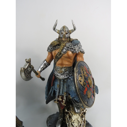 197 - Two Resin Viking warrior figurines, one by Veronese. The tallest stands 12