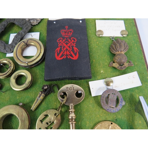 356 - Large selection of Military related cap badges, buttons, metal dectecting finds etc.