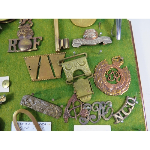 356 - Large selection of Military related cap badges, buttons, metal dectecting finds etc.