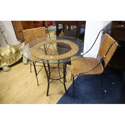 1215 - Garden patio set comprising of a glass topped table with two matching chairs.  Table height is 29 in... 