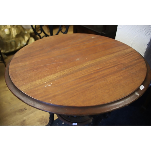 1216 - Garden Patio set comprising of a  wooden topped metal table with pierced decoration together with tw... 