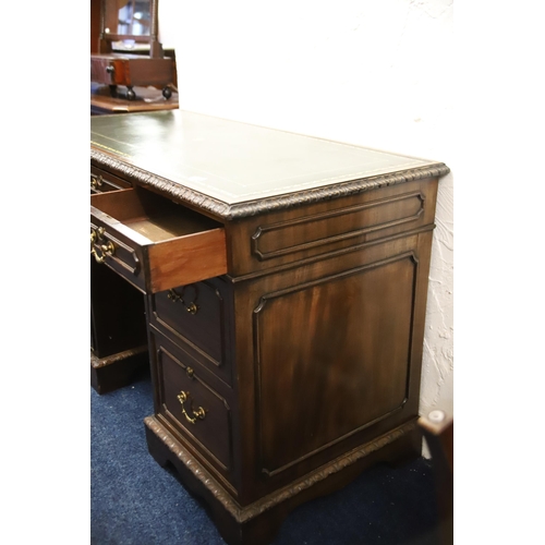 1222 - Leather topped kneehole desk which measures approx H:41 x W:48 x D:23 inches. Comes with an elongate... 