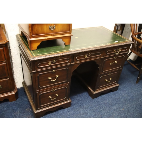 1222 - Leather topped kneehole desk which measures approx H:41 x W:48 x D:23 inches. Comes with an elongate... 