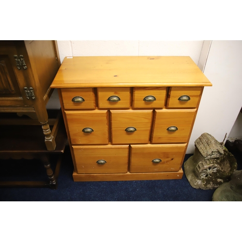 1229 - Useful pine chest of 9 drawers. Dimensions are approx H:45 x W:45 x D:16 inches. See photos.