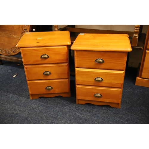 1230 - Pair of three drawer pine bedside chests.  Each measures approx H:23 x W:16 x D:13 inches. See photo... 