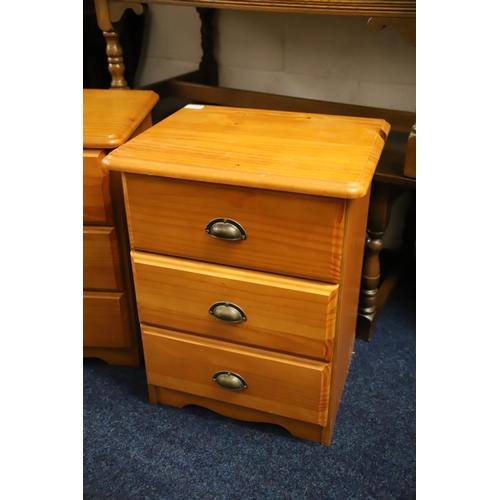 1230 - Pair of three drawer pine bedside chests.  Each measures approx H:23 x W:16 x D:13 inches. See photo... 