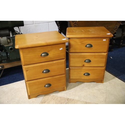 1231 - Pair of three drawer pine bedside chests.  Each measures approx H:23 x W:16 x D:13 inches. See photo... 