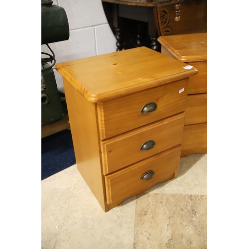 1231 - Pair of three drawer pine bedside chests.  Each measures approx H:23 x W:16 x D:13 inches. See photo... 