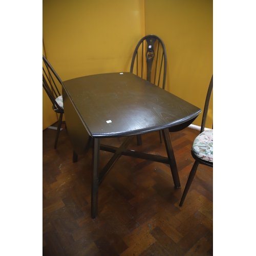 909 - Ercol Drop leaf dining table with four matching chairs in the Quaker style with swan motifs to the c... 