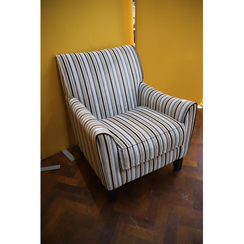 911 - Stylish Modern armchair with striped fabric.  Complete with Fire safety ticket.  In excellent condit... 