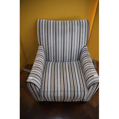 911 - Stylish Modern armchair with striped fabric.  Complete with Fire safety ticket.  In excellent condit... 