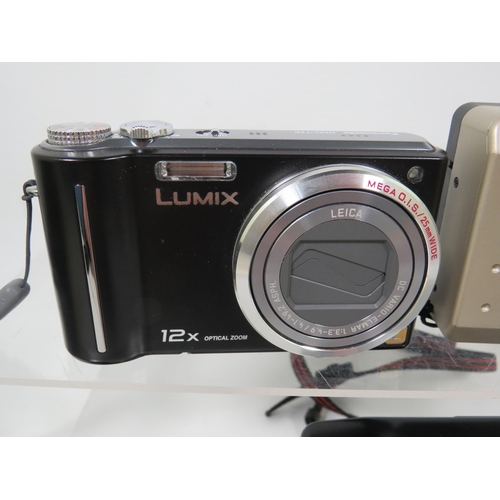 292 - Lumix Leica 12X optical Zoom Digital Camera, a Vivitar lP021 and a Hanimax 35mm motordrive plus a sm... 