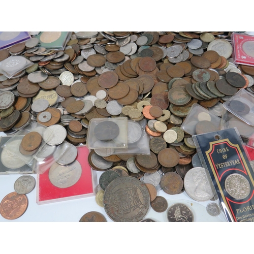 296 - Large amount of mostly UK copper and Cupro Crowns plus other collectable coins .  Total weight appro... 