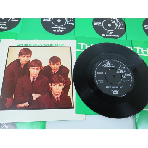 299 - Boxed Collection of 24 Vinyl 45's Beatles records with collectors box. All in sleeves and appear to ... 