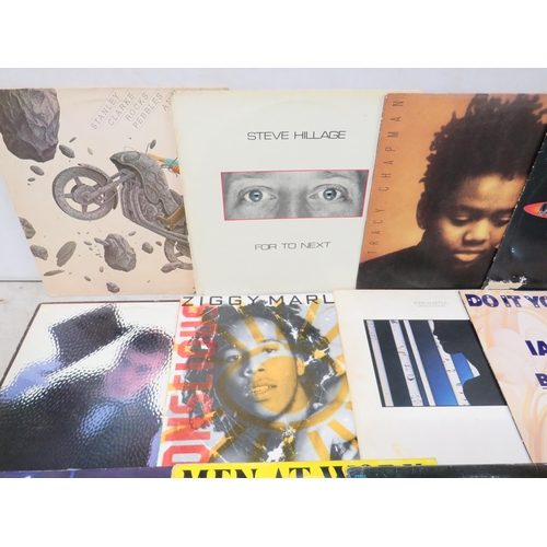 304 - Fifteen Vinyl Rock and Pop LP' Albums by various artists to include, Ziggy Merley, Tracy Chapman, Ia... 