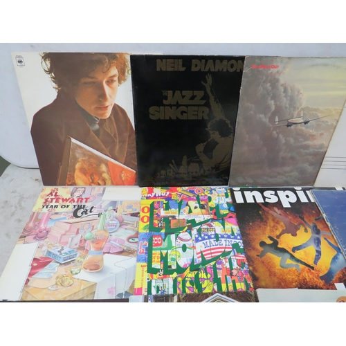 305 - Fifteen Vinyl Rock and Pop LP' Albums by various artists to include, Santana, UB40, Grace Jones, Hap... 