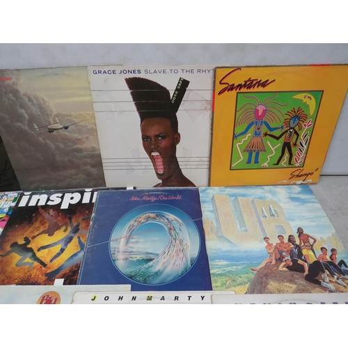 305 - Fifteen Vinyl Rock and Pop LP' Albums by various artists to include, Santana, UB40, Grace Jones, Hap... 