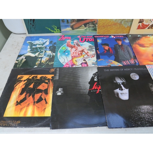 308 - Fifteen Vinyl Rock and Pop LP' Albums by various artists to include, Frank Zappa, thompson Twins,  J... 