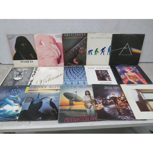 309 - Fifteen Vinyl Rock and Pop LP' Albums by various artists to include, Super Tramp, Santana, Jean Mich... 