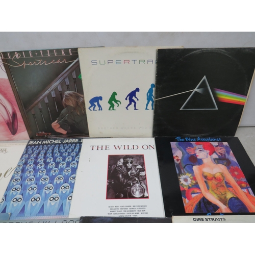 309 - Fifteen Vinyl Rock and Pop LP' Albums by various artists to include, Super Tramp, Santana, Jean Mich... 