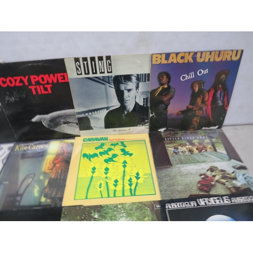 310 - Fifteen Vinyl Rock and Pop LP' Albums by various artists to include,  Sting, Bob Marley, Cozy Powell... 