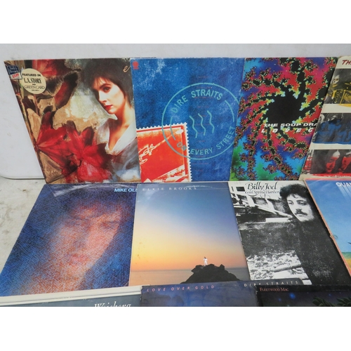 311 - Fifteen Vinyl Rock and Pop LP' Albums by various artists to include, UB40, Dire Straights, Police, T... 