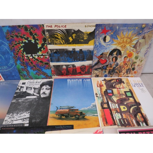 311 - Fifteen Vinyl Rock and Pop LP' Albums by various artists to include, UB40, Dire Straights, Police, T... 