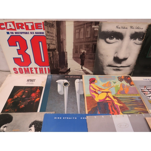 313 - Fifteen Vinyl Rock and Pop LP' Albums by various artists to include, Wailers, UB40, Eurythmics, Dire... 