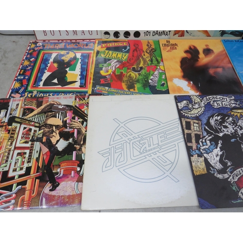 315 - Fifteen Vinyl Rock and Pop LP' Albums by various artists to include, Dire Straights, USM, Peter Gree... 