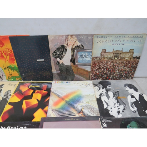 318 - Fifteen Vinyl Rock and Pop LP' Albums by various artists to include, Level 42, Fleetwood, Santana, G... 