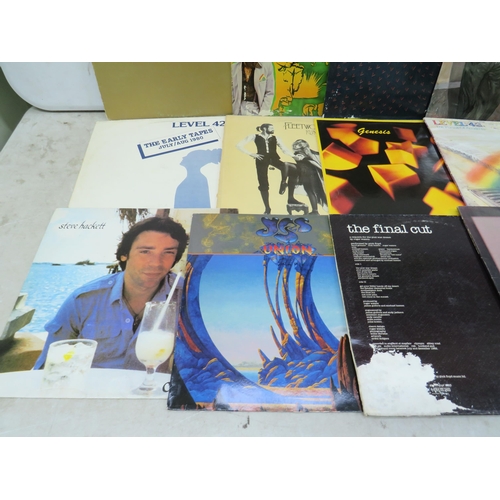 318 - Fifteen Vinyl Rock and Pop LP' Albums by various artists to include, Level 42, Fleetwood, Santana, G... 