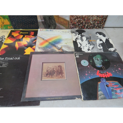 318 - Fifteen Vinyl Rock and Pop LP' Albums by various artists to include, Level 42, Fleetwood, Santana, G... 